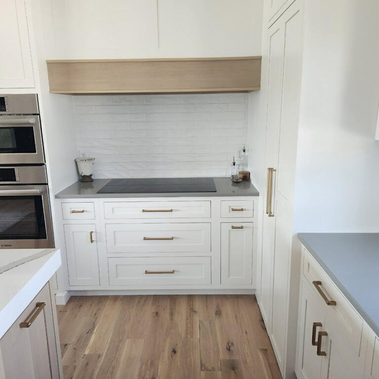 Kitchen Remodel Virginia Tile Marlow Glossy 3x12 in Cloud with Paramount Santa Barbara Oak solid hardwood in Antique.