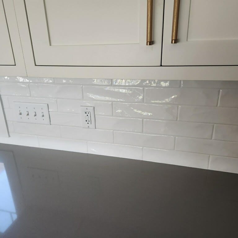 Backsplash installtion Virginia Tile Marlow Glossy 3x12 in Cloud