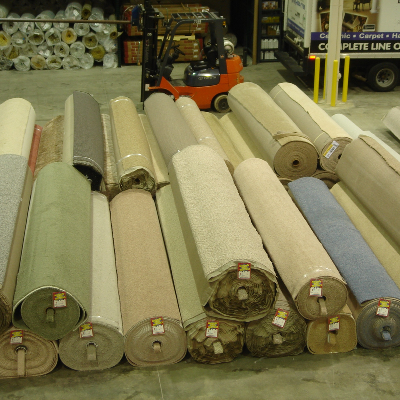 Carpet Rolls On Floor in warehouse from Vallow Floor Coverings in Edwardsville, IL